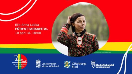 Foto på Elin Anna Labba på samiska traditionella färger